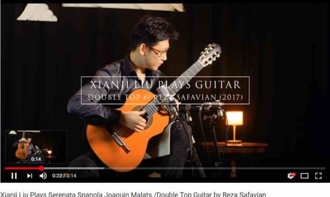 Xianji-liu joue une guitare classique de reza Safavian luthier à vendre